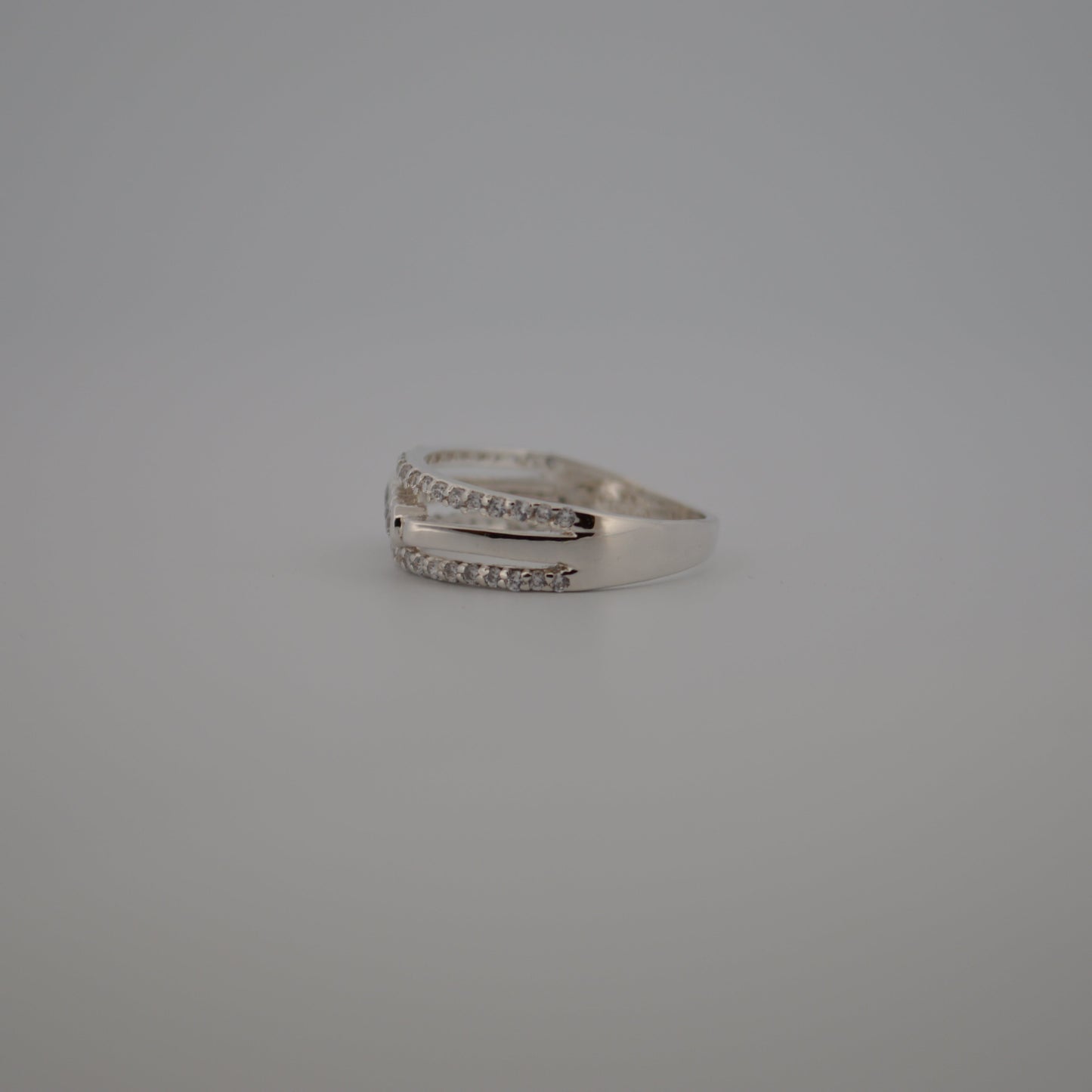 Silver ring on a gray background