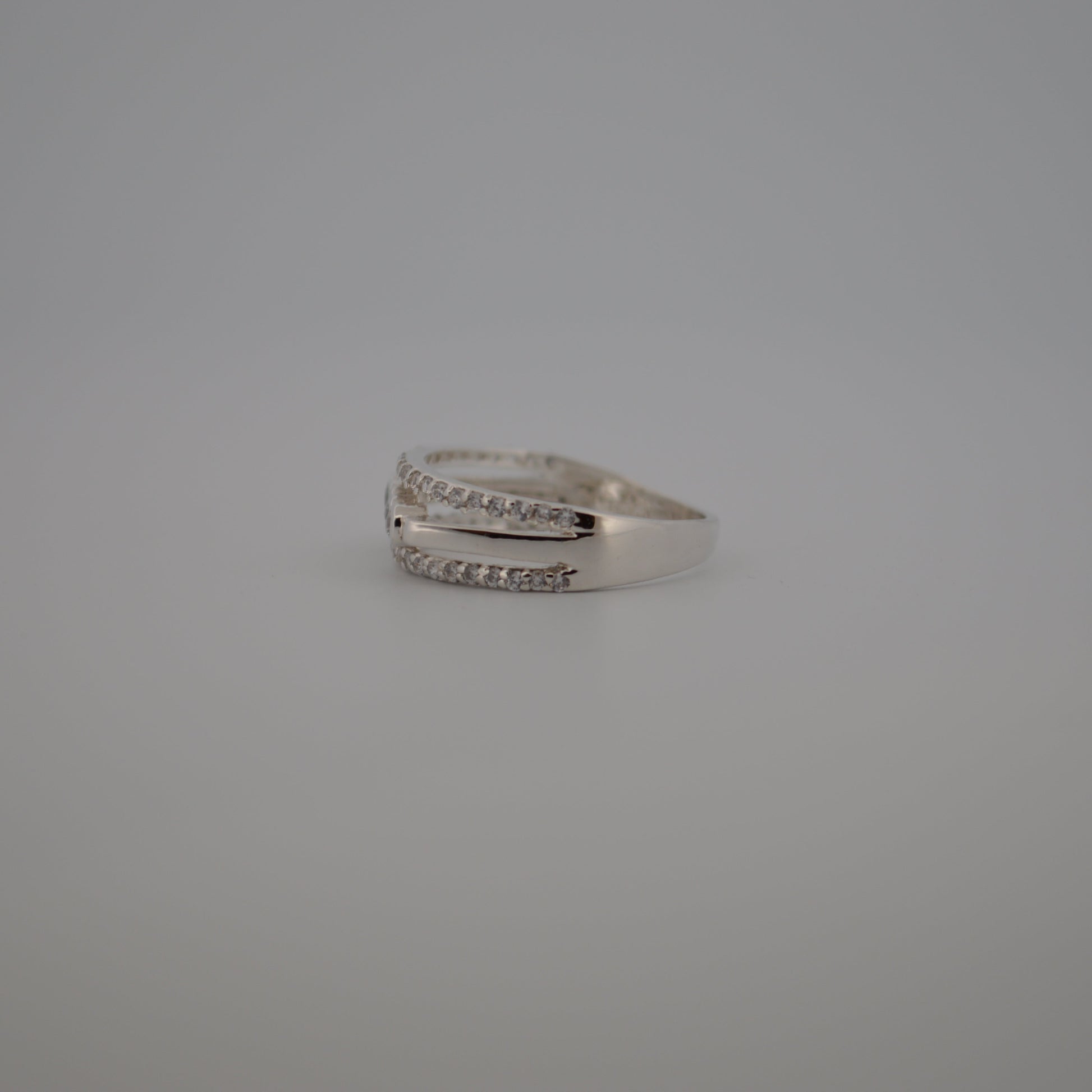 Silver ring on a gray background