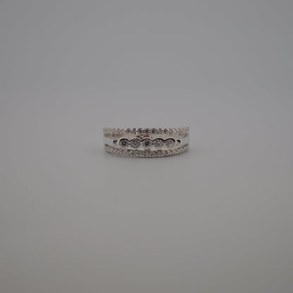 Silver ring on a gray background